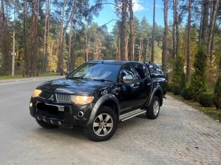 Черный Мицубиси Л 200, объемом двигателя 2.5 л и пробегом 180 тыс. км за 7200 $, фото 1 на Automoto.ua