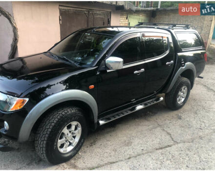 Чорний Міцубісі Л 200, об'ємом двигуна 2.48 л та пробігом 330 тис. км за 11800 $, фото 1 на Automoto.ua