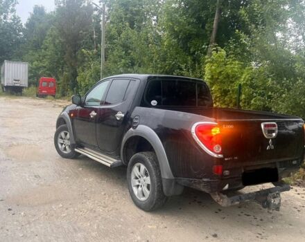 Чорний Міцубісі Л 200, об'ємом двигуна 2.5 л та пробігом 110 тис. км за 7000 $, фото 1 на Automoto.ua