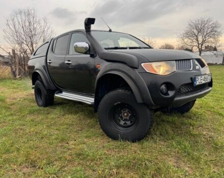 Черный Мицубиси Л 200, объемом двигателя 2.5 л и пробегом 236 тыс. км за 2850 $, фото 1 на Automoto.ua