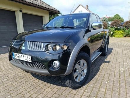 Черный Мицубиси Л 200, объемом двигателя 2.5 л и пробегом 230 тыс. км за 3150 $, фото 1 на Automoto.ua