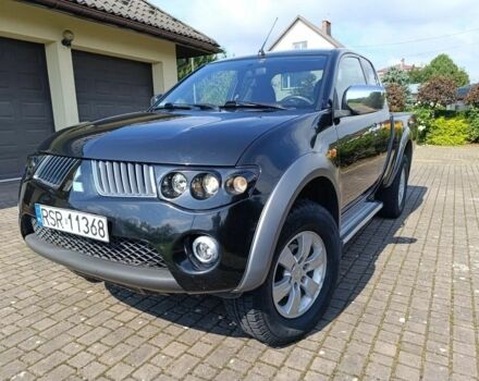 Черный Мицубиси Л 200, объемом двигателя 2.5 л и пробегом 230 тыс. км за 3150 $, фото 1 на Automoto.ua