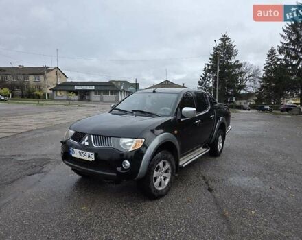 Чорний Міцубісі Л 200, об'ємом двигуна 2.48 л та пробігом 302 тис. км за 12500 $, фото 1 на Automoto.ua