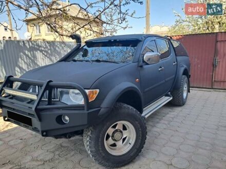 Мицубиси Л 200 2008 в Одессе на Automoto.ua Черный Мицубиси Л 200, объемом двигателя 2.48 л и пробегом 156 тыс. км за 17800 $, фото 1 на Automoto.ua
