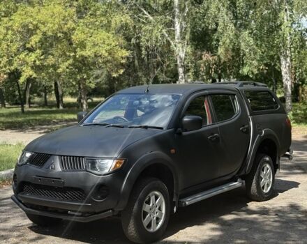 Чорний Міцубісі Л 200, об'ємом двигуна 2.5 л та пробігом 123 тис. км за 5750 $, фото 1 на Automoto.ua