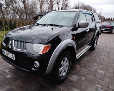 Чорний Міцубісі Л 200, об'ємом двигуна 2.5 л та пробігом 220 тис. км за 10500 $, фото 1 на Automoto.ua