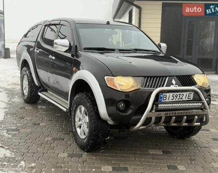 Чорний Міцубісі Л 200, об'ємом двигуна 2.5 л та пробігом 258 тис. км за 10800 $, фото 1 на Automoto.ua