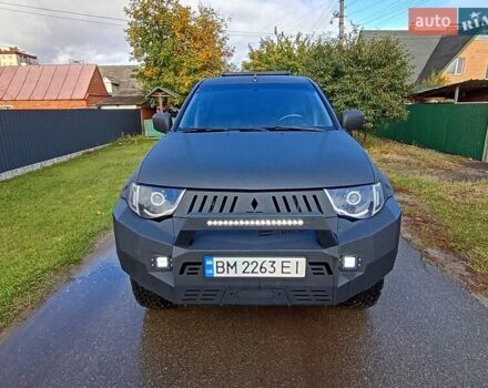 Чорний Міцубісі Л 200, об'ємом двигуна 2.48 л та пробігом 178 тис. км за 15500 $, фото 1 на Automoto.ua