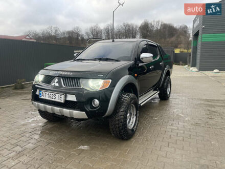 Черный Мицубиси Л 200, объемом двигателя 2.48 л и пробегом 370 тыс. км за 12750 $, фото 1 на Automoto.ua