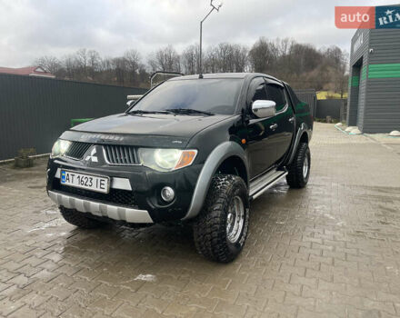 Черный Мицубиси Л 200, объемом двигателя 2.48 л и пробегом 370 тыс. км за 12750 $, фото 1 на Automoto.ua