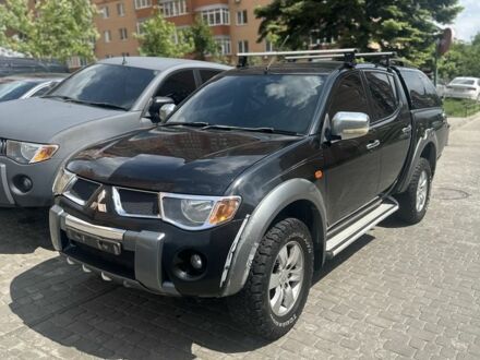 Мицубиси Л 200 2009 в Днепре (Днепропетровске) на Automoto.ua Черный Мицубиси Л 200, объемом двигателя 2.5 л и пробегом 201 тыс. км за 8499 $, фото 1 на Automoto.ua
