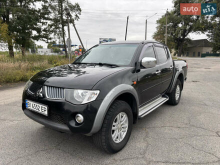 Чорний Міцубісі Л 200, об'ємом двигуна 2.5 л та пробігом 208 тис. км за 12800 $, фото 1 на Automoto.ua