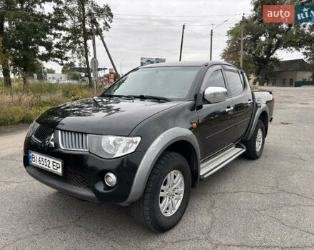 Чорний Міцубісі Л 200, об'ємом двигуна 2.5 л та пробігом 208 тис. км за 12800 $, фото 1 на Automoto.ua