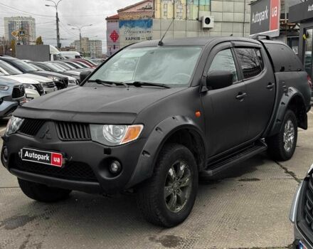 Чорний Міцубісі Л 200, об'ємом двигуна 2.5 л та пробігом 330 тис. км за 9890 $, фото 1 на Automoto.ua