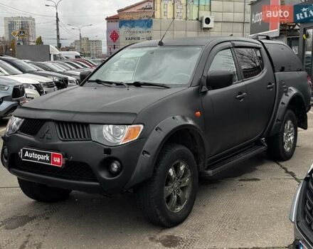 Чорний Міцубісі Л 200, об'ємом двигуна 2.5 л та пробігом 330 тис. км за 9890 $, фото 1 на Automoto.ua