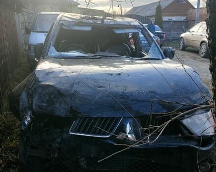 Черный Мицубиси Л 200, объемом двигателя 0 л и пробегом 230 тыс. км за 1420 $, фото 1 на Automoto.ua