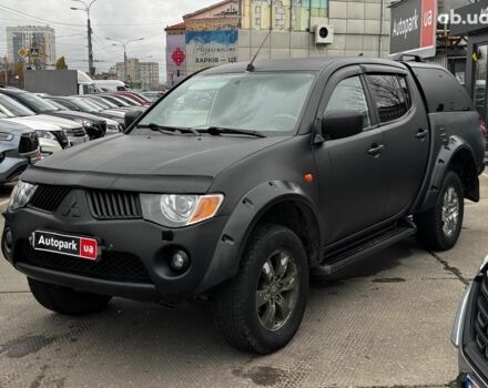 Чорний Міцубісі Л 200, об'ємом двигуна 2.5 л та пробігом 330 тис. км за 9890 $, фото 1 на Automoto.ua