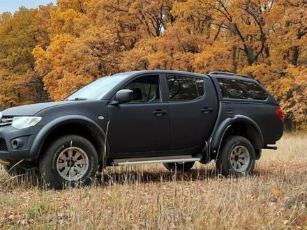 Міцубісі Л 200 2010 у Харкові на Automoto.ua Чорний Міцубісі Л 200, об'ємом двигуна 2.5 л та пробігом 221 тис. км за 13275 $, фото 1 на Automoto.ua