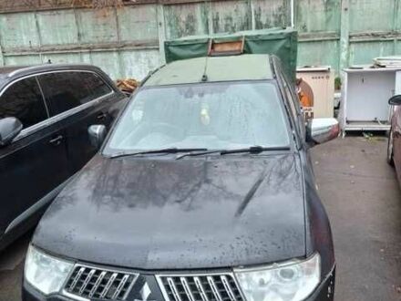 Черный Мицубиси Л 200, объемом двигателя 2.5 л и пробегом 270 тыс. км за 4500 $, фото 1 на Automoto.ua