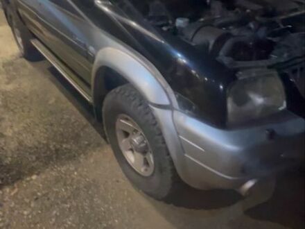 Черный Мицубиси Л 200, объемом двигателя 2.5 л и пробегом 160 тыс. км за 4200 $, фото 1 на Automoto.ua