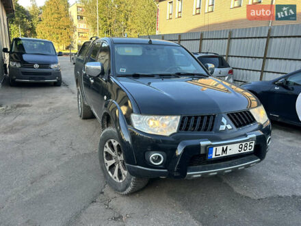 Чорний Міцубісі Л 200, об'ємом двигуна 2.5 л та пробігом 305 тис. км за 10624 $, фото 1 на Automoto.ua
