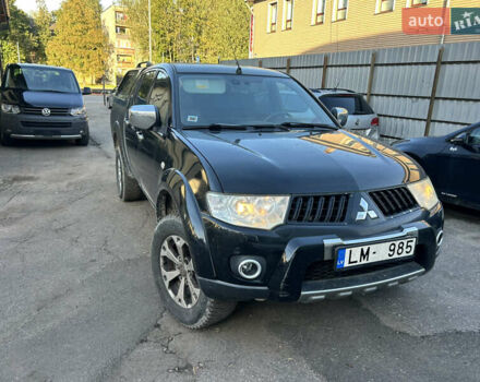 Чорний Міцубісі Л 200, об'ємом двигуна 2.5 л та пробігом 305 тис. км за 10624 $, фото 1 на Automoto.ua