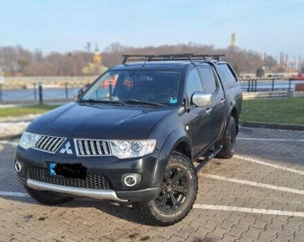 Черный Мицубиси Л 200, объемом двигателя 2.5 л и пробегом 184 тыс. км за 4002 $, фото 1 на Automoto.ua