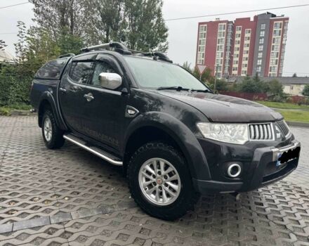 Чорний Міцубісі Л 200, об'ємом двигуна 2.5 л та пробігом 89 тис. км за 7500 $, фото 1 на Automoto.ua