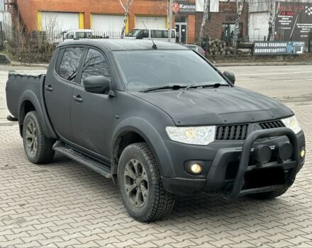 Черный Мицубиси Л 200, объемом двигателя 2.5 л и пробегом 128 тыс. км за 5650 $, фото 1 на Automoto.ua