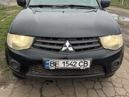 Черный Мицубиси Л 200, объемом двигателя 2.48 л и пробегом 295 тыс. км за 14800 $, фото 1 на Automoto.ua