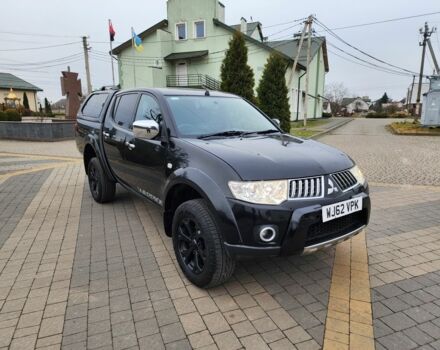 Чорний Міцубісі Л 200, об'ємом двигуна 2.5 л та пробігом 114 тис. км за 8748 $, фото 1 на Automoto.ua