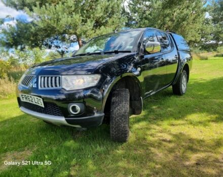 Чорний Міцубісі Л 200, об'ємом двигуна 2.5 л та пробігом 180 тис. км за 7200 $, фото 1 на Automoto.ua