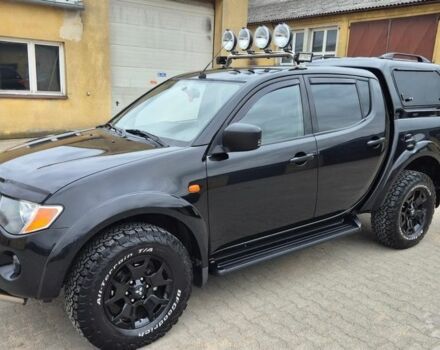 Чорний Міцубісі Л 200, об'ємом двигуна 2.5 л та пробігом 218 тис. км за 4974 $, фото 1 на Automoto.ua