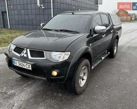 Черный Мицубиси Л 200, объемом двигателя 2.48 л и пробегом 270 тыс. км за 16500 $, фото 1 на Automoto.ua