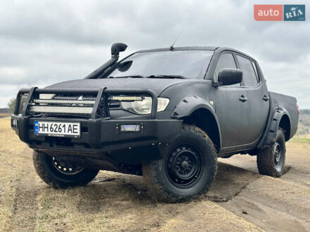 Мицубиси Л 200 2013 в Одессе на Automoto.ua Черный Мицубиси Л 200, объемом двигателя 2.48 л и пробегом 180 тыс. км за 13999 $, фото 1 на Automoto.ua