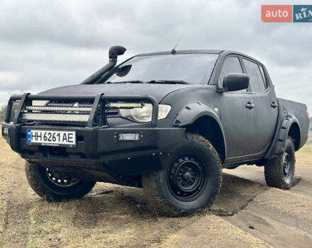 Чорний Міцубісі Л 200, об'ємом двигуна 2.48 л та пробігом 180 тис. км за 13999 $, фото 1 на Automoto.ua
