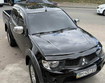 Міцубісі Л 200 2013 у Одесі на Automoto.ua Чорний Міцубісі Л 200, об'ємом двигуна 2.48 л та пробігом 94 тис. км за 14800 $, фото 1 на Automoto.ua