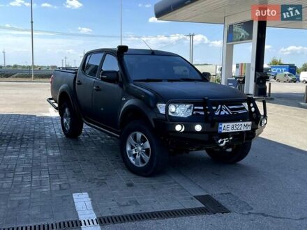 Мицубиси Л 200 2014 в Днепре (Днепропетровске) на Automoto.ua Черный Мицубиси Л 200, объемом двигателя 2.48 л и пробегом 165 тыс. км за 16300 $, фото 1 на Automoto.ua