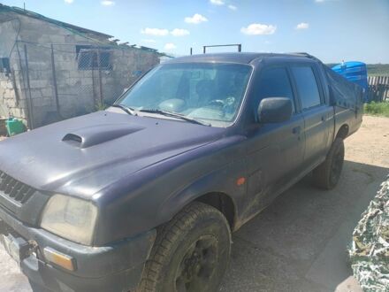 Мицубиси Л 200 1998 в Великой Михайловке на Automoto.ua Фиолетовый Мицубиси Л 200, объемом двигателя 2.5 л и пробегом 478 тыс. км за 3500 $, фото 1 на Automoto.ua