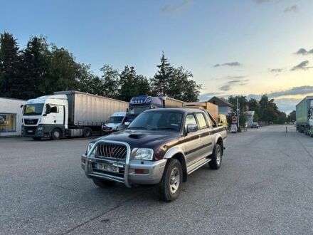 Мицубиси Л 200 2003 в Сумах на Automoto.ua Фиолетовый Мицубиси Л 200, объемом двигателя 2.5 л и пробегом 350 тыс. км за 2450 $, фото 1 на Automoto.ua