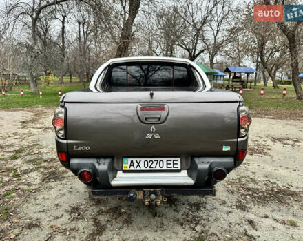 Коричневий Міцубісі Л 200, об'ємом двигуна 2.48 л та пробігом 317 тис. км за 15500 $, фото 3 на Automoto.ua