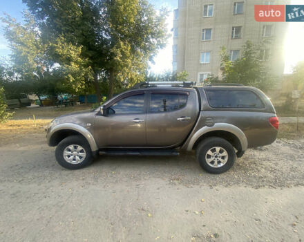 Коричневий Міцубісі Л 200, об'ємом двигуна 2.48 л та пробігом 340 тис. км за 14000 $, фото 2 на Automoto.ua