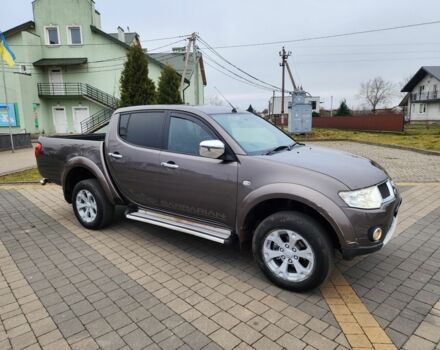 Коричневый Мицубиси Л 200, объемом двигателя 2.5 л и пробегом 159 тыс. км за 8398 $, фото 2 на Automoto.ua