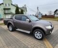 Коричневый Мицубиси Л 200, объемом двигателя 2.5 л и пробегом 159 тыс. км за 8398 $, фото 2 на Automoto.ua