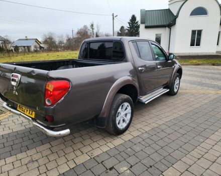 Коричневый Мицубиси Л 200, объемом двигателя 2.5 л и пробегом 159 тыс. км за 8398 $, фото 11 на Automoto.ua