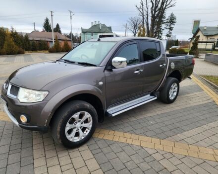 Коричневый Мицубиси Л 200, объемом двигателя 2.5 л и пробегом 159 тыс. км за 8398 $, фото 7 на Automoto.ua