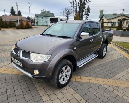 Коричневый Мицубиси Л 200, объемом двигателя 2.5 л и пробегом 159 тыс. км за 8398 $, фото 6 на Automoto.ua