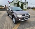 Коричневый Мицубиси Л 200, объемом двигателя 2.5 л и пробегом 159 тыс. км за 8398 $, фото 1 на Automoto.ua