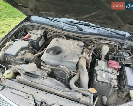 Коричневый Мицубиси Л 200, объемом двигателя 2.48 л и пробегом 251 тыс. км за 15500 $, фото 18 на Automoto.ua