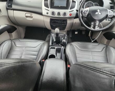 Коричневый Мицубиси Л 200, объемом двигателя 2.5 л и пробегом 159 тыс. км за 8398 $, фото 20 на Automoto.ua